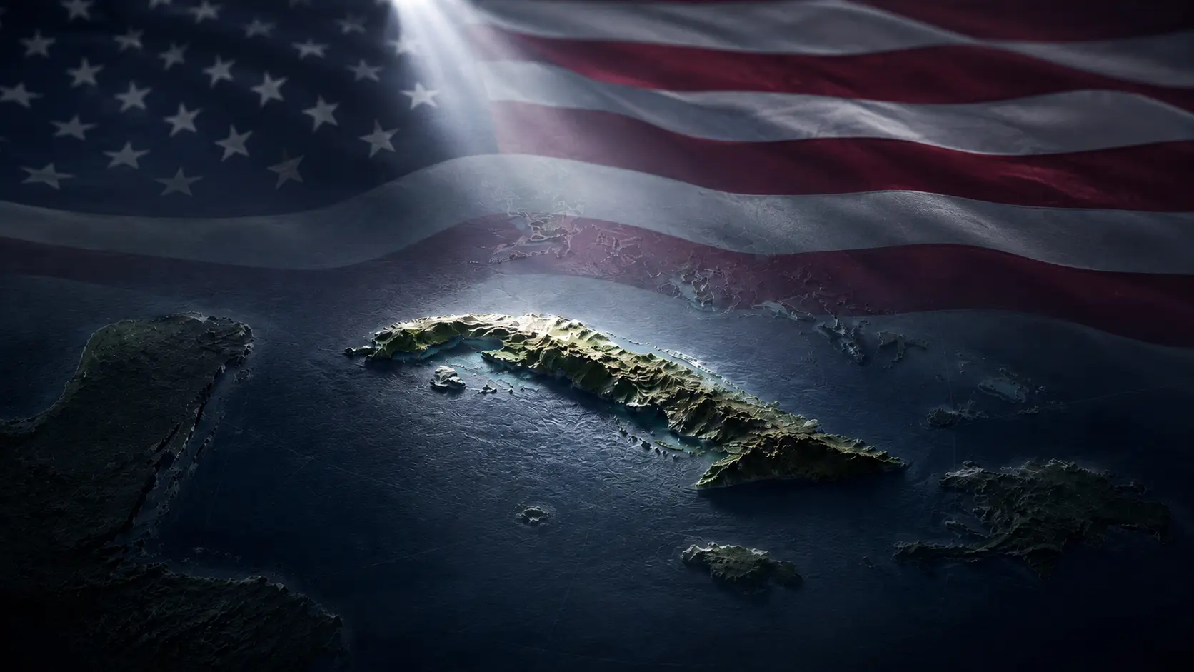 Imagem conceitual mostra o mapa tridimensional de Cuba iluminado parcialmente por um holofote vindo do norte, enquanto parte da ilha permanece em sombra. Ao fundo, aparece uma bandeira dos Estados Unidos desfocada sobre o mapa escuro do Caribe, simbolizando a pressão americana sobre Havana.