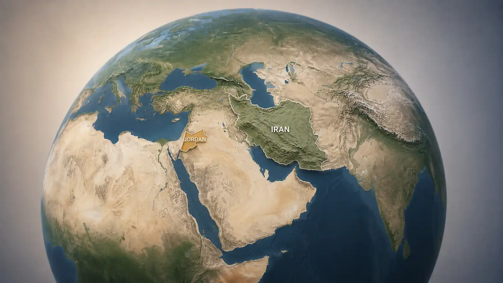 Mapa em globo inclinado destaca Irã e Jordânia em meio à escalada militar no Oriente Médio.